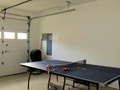ping pong table in 2 car garage